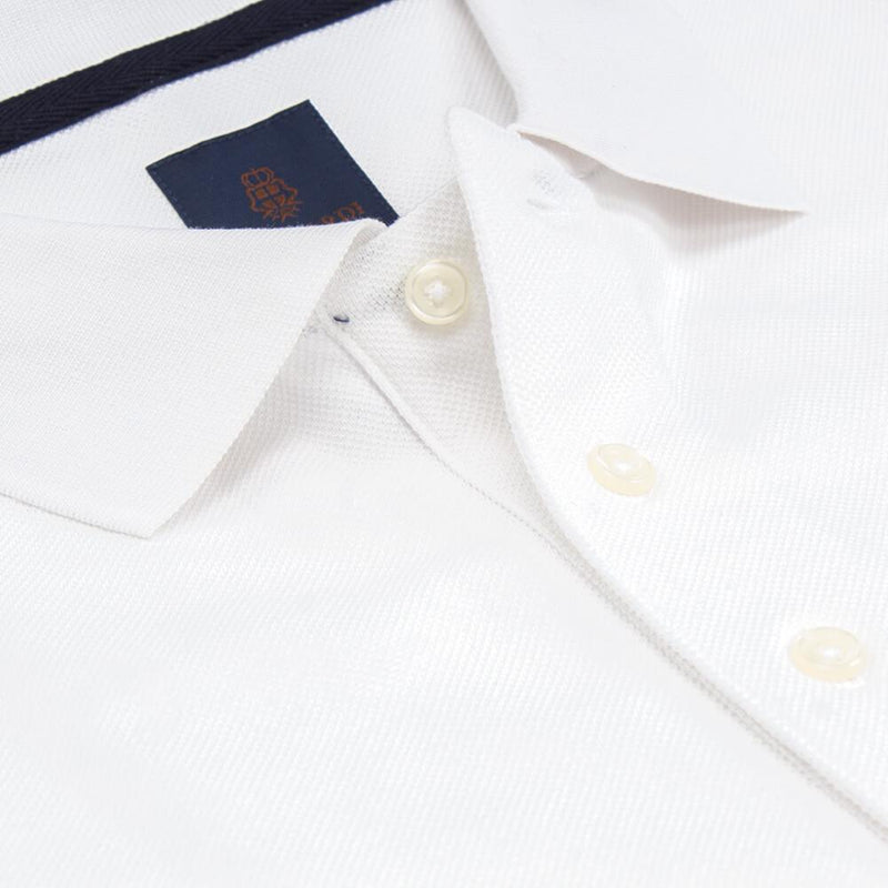 POLO BLANC EN BRODERIE PIQUÉE