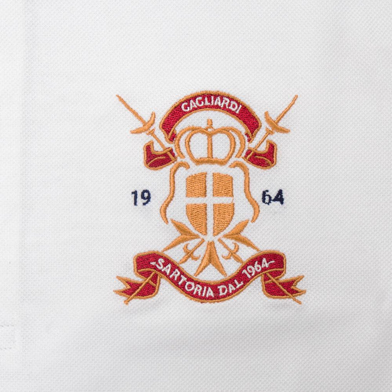 POLO BLANC EN BRODERIE PIQUÉE